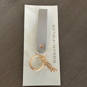Rodan + Fields wristlet key chain
